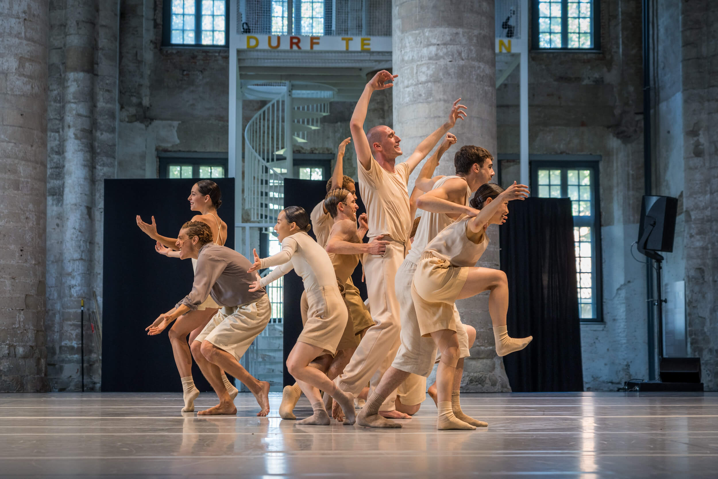Dancers performing a scene of a modern dance choreography